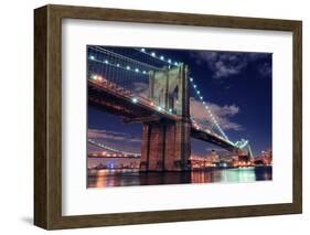 Brooklyn Bridge Closeup over East River at Night in New York City Manhattan with Lights and Reflect-Songquan Deng-Framed Photographic Print