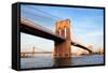 Brooklyn Bridge over East River Viewed from New York City Lower Manhattan Waterfront at Sunset.-Songquan Deng-Framed Stretched Canvas
