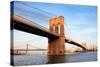 Brooklyn Bridge over East River Viewed from New York City Lower Manhattan Waterfront at Sunset.-Songquan Deng-Stretched Canvas