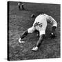 Brooklyn Dodgers Pitcher Ed Albosta Doing Stretching Exercise During Spring Training-William Vandivert-Stretched Canvas