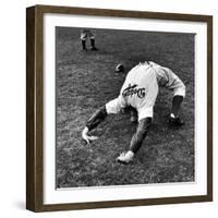 Brooklyn Dodgers Pitcher Ed Albosta Doing Stretching Exercise During Spring Training-William Vandivert-Framed Premium Photographic Print