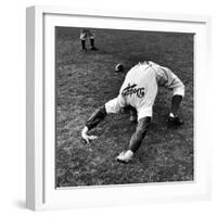 Brooklyn Dodgers Pitcher Ed Albosta Doing Stretching Exercise During Spring Training-William Vandivert-Framed Premium Photographic Print