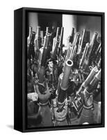 Brooklyn Naval Yard Worker Looking over a Storage of Guns-George Strock-Framed Stretched Canvas