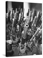 Brooklyn Naval Yard Worker Looking over a Storage of Guns-George Strock-Stretched Canvas