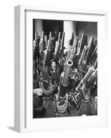 Brooklyn Naval Yard Worker Looking over a Storage of Guns-George Strock-Framed Photographic Print