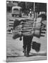 Broom Peddler Going Door to Door-Cornell Capa-Mounted Photographic Print