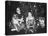 Brother and Sister Pose by the Christmas Tree, Ca. 1960-null-Stretched Canvas