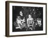 Brother and Sister Pose by the Christmas Tree, Ca. 1960-null-Framed Photographic Print