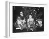 Brother and Sister Pose by the Christmas Tree, Ca. 1960-null-Framed Photographic Print