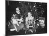 Brother and Sister Pose by the Christmas Tree, Ca. 1960-null-Mounted Photographic Print