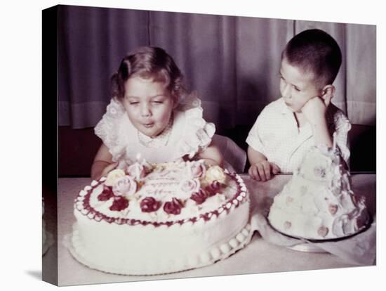 Brother Watches His Sister Blow Out Candles on Birthday Cake, Ca. 1956-null-Stretched Canvas