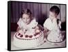 Brother Watches His Sister Blow Out Candles on Birthday Cake, Ca. 1956-null-Framed Stretched Canvas