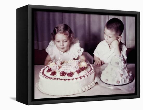 Brother Watches His Sister Blow Out Candles on Birthday Cake, Ca. 1956-null-Framed Stretched Canvas