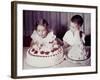 Brother Watches His Sister Blow Out Candles on Birthday Cake, Ca. 1956-null-Framed Photographic Print