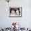 Brother Watches His Sister Blow Out Candles on Birthday Cake, Ca. 1956-null-Framed Photographic Print displayed on a wall