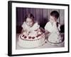 Brother Watches His Sister Blow Out Candles on Birthday Cake, Ca. 1956-null-Framed Photographic Print