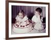 Brother Watches His Sister Blow Out Candles on Birthday Cake, Ca. 1956-null-Framed Photographic Print