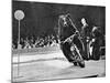 Brown Bear Riding a Motorcycle at the Bertram Mills Circus-null-Mounted Photographic Print