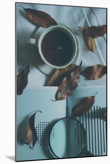 Brown Leaves and a Cup of Coffee-Carolina Hernandez-Mounted Photographic Print
