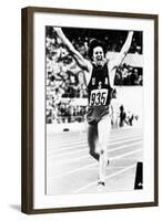 Bruce Jenner Just after Crossing the Finish Line to Win the Decathlon-null-Framed Photo