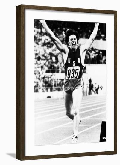 Bruce Jenner Just after Crossing the Finish Line to Win the Decathlon-null-Framed Photo