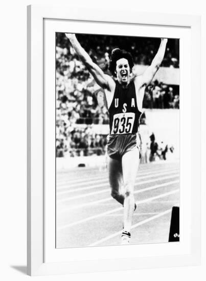 Bruce Jenner Just after Crossing the Finish Line to Win the Decathlon-null-Framed Photo