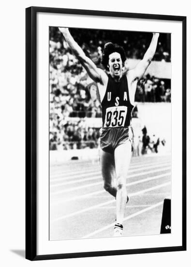 Bruce Jenner Just after Crossing the Finish Line to Win the Decathlon-null-Framed Photo