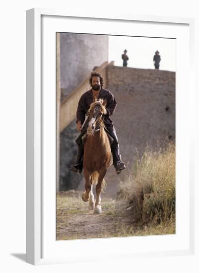 Bud Spencer Riding a Horse on the Set of Soldier of Fortune-null-Framed Photographic Print