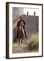 Bud Spencer Riding a Horse on the Set of Soldier of Fortune-null-Framed Photographic Print