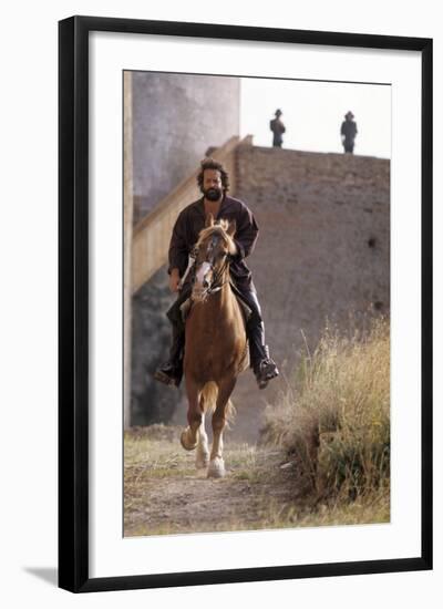 Bud Spencer Riding a Horse on the Set of Soldier of Fortune-null-Framed Photographic Print