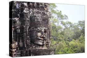 Buddha Face Carved in Stone at the Bayon Temple, Angkor Thom, Angkor, Cambodia-Yadid Levy-Stretched Canvas