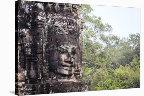 Buddha Face Carved in Stone at the Bayon Temple, Angkor Thom, Angkor, Cambodia-Yadid Levy-Stretched Canvas