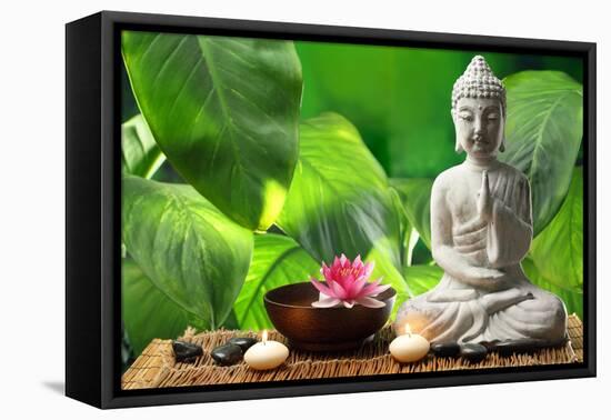 Buddha in Meditation with Lotus Flower and Burning Candles-Liang Zhang-Framed Stretched Canvas