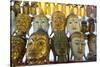 Buddha masks on display at shop, Mandalay, Myanmar (Burma)-Jan Miracky-Stretched Canvas