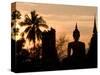 Buddha Statue and Sunset, Thailand-Gavriel Jecan-Stretched Canvas