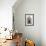 Buddha Statue and Water Pot Left by Buddhist Devotee Inside Shrine-Annie Owen-Framed Photographic Print displayed on a wall