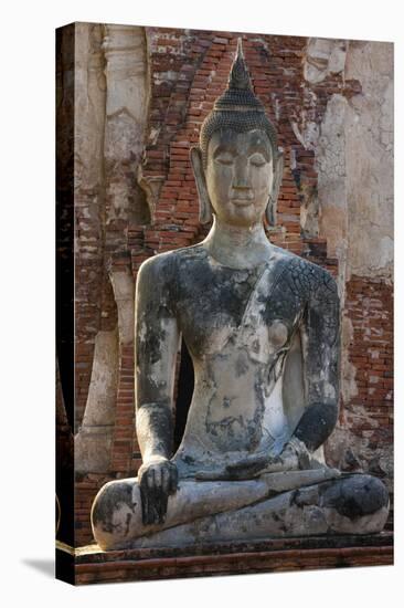 Buddha statue at Wat Mahathat, Ayutthaya Historical Park, Thailand-Art Wolfe-Stretched Canvas