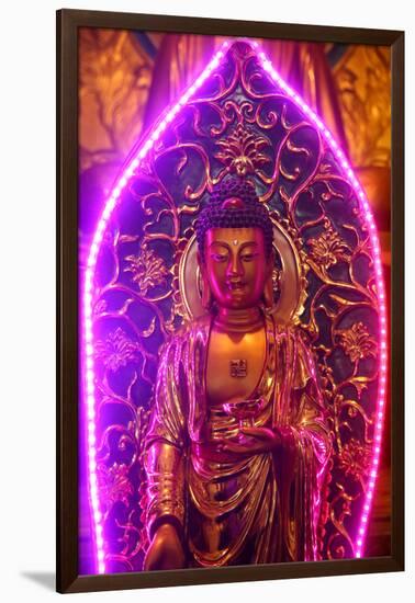 Buddha statue with neon light, Chua Thien Hung Buddhist Pagoda, Ho Chi Minh City, Vietnam, Indochin-null-Framed Premium Photographic Print