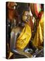 Buddha Statue With Offerings at Wat Phnom Temple, Phnom Penh, Cambodia, Indochina,-null-Stretched Canvas