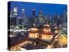 Buddha Tooth Relic Temple and skyscrapers at dusk, Chinatown, Singapore-Ian Trower-Stretched Canvas