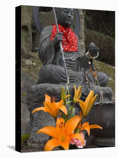 Buddha with Red Scarf and Fresh Flowers, Daisho in Temple, Miyajima, Honshu, Japan-Simanor Eitan-Stretched Canvas