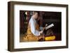 Buddhist ceremony at temple, monk playing on a wooden fish (percussion instrument)-Godong-Framed Photographic Print