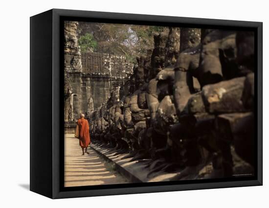 Buddhist Monk Approaching South Gate, Angkor Thom, Angkor, Cambodia, Indochina-Andrew Mcconnell-Framed Stretched Canvas