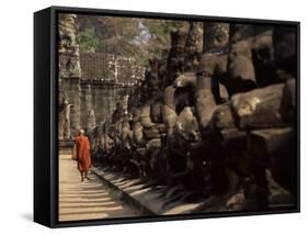 Buddhist Monk Approaching South Gate, Angkor Thom, Angkor, Cambodia, Indochina-Andrew Mcconnell-Framed Stretched Canvas