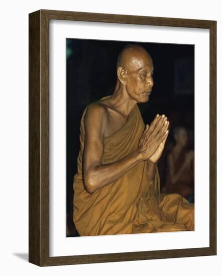 Buddhist Monk Meditating, Wat Suntorn, Bangkok, Thailand, Southeast Asia-John Henry Claude Wilson-Framed Photographic Print