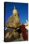 Buddhist Monk Praying at the Golden Rock of Nwa La Bo-Tuul-Stretched Canvas