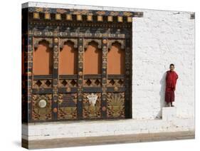 Buddhist Monk, Punakha Dzong, Punakha, Bhutan-Angelo Cavalli-Stretched Canvas