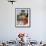 Buddhist Monk Reading a Book, Wat Xieng Thong, Luang Prabang, Laos, Indochina, Southeast Asia-Jane Sweeney-Framed Photographic Print displayed on a wall