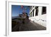 Buddhist Monks in Red Robes Walking in the Early Morning Sunshine-Annie Owen-Framed Photographic Print