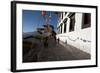 Buddhist Monks in Red Robes Walking in the Early Morning Sunshine-Annie Owen-Framed Photographic Print